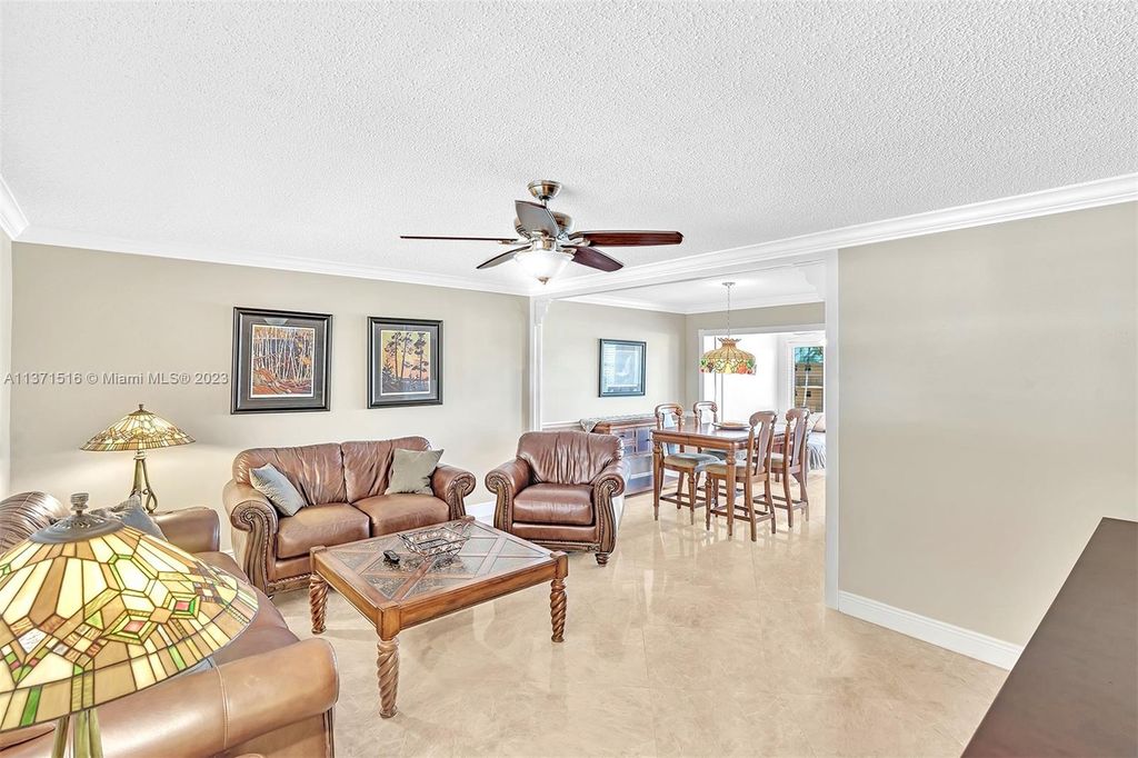 Photo of 14 NE Colonial Club Dr #303, Boynton Beach, FL 33435 (MLS # A11371516)