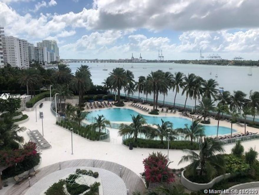 PRICED TO SELL !! Have you seen The Flamingo! Wow! Must See This 2 Bedroom, 2 Bath with unbeatable direct pool deck and bay views. Located at the newly renovated Flamingo Point property. Brand new, never been used stainless steel appliances installed; glass stove-top oven, large model refrigerator, microwave, dishwasher and washer/dryer inside the unit. NEW BERBER CARPET installed one month ago, never been used. Dining, boating, shopping, fitness all available at your fingertips. Walk to Whole Foods, restaurants, bars, activities, Lincoln Road. A short 7 minute drive from Downtown, Brickell, Wynwood, & Design District.