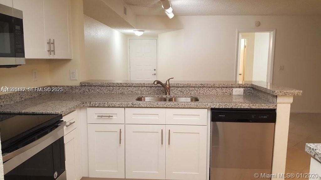 Photo of 9022 W Atlantic Blvd #222, Coral Springs, FL 33071 (MLS # A11923187)