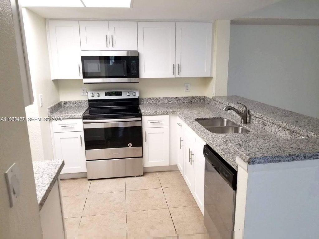 Photo of 9022 W Atlantic Blvd #222, Coral Springs, FL 33071 (MLS # A11923187)