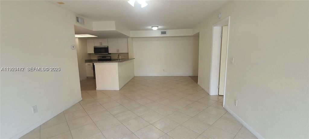 Photo of 9022 W Atlantic Blvd #222, Coral Springs, FL 33071 (MLS # A11923187)