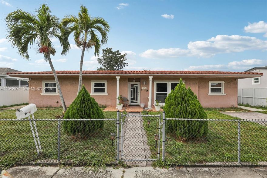 Discover the Perfect Blend of Space, Security, and Style in Miami Gardens. Welcome to this impeccably maintained residence, offering over 1,900 sq. ft. of bright, air-conditioned living space designed for modern comfort. This home boasts a desirable split-floor plan featuring 3 spacious bedrooms and 2 bathrooms, plus two versatile additional rooms—perfect for a home office, private gym, or guest quarters. Your peace of mind is built-in: the property features full impact windows throughout, along with a roof and AC system both updated in 2018. Strategically located just a block from the Palmetto Expressway and nestled between 47th and 57th Avenues, you are minutes away from the best of South Florida. For those who love the outdoors, the expansive 8,900+ sq. ft. lot is a true tropical canvas, offering more than enough room to design your dream pool and backyard oasis.