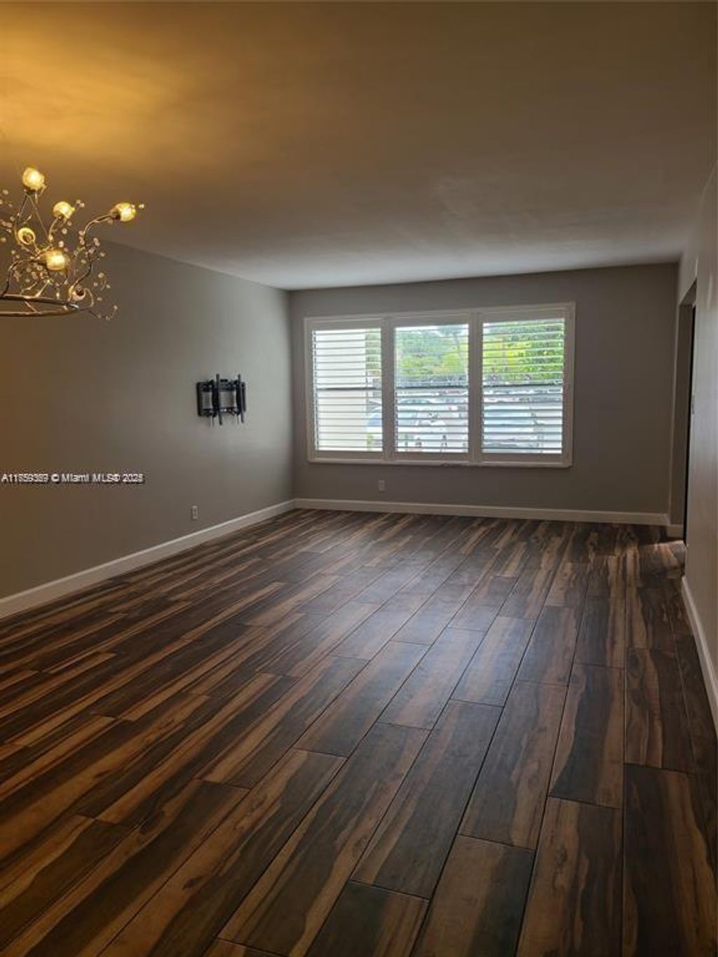 Photo of 2320 S Cypress Bend Dr #105, Pompano Beach, FL 33069 (MLS # A11759369)