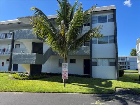Photo of 8330 Sands Point Blvd #N210, Tamarac, FL 33321 (MLS # A11844664)