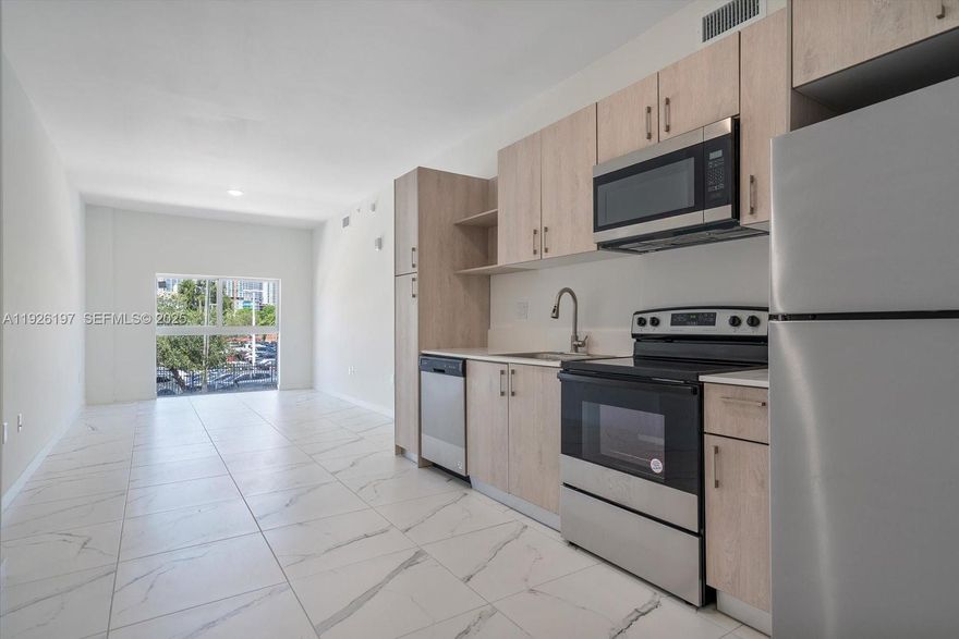 Welcome to Bamboo, a brand-new multifamily building that combines comfort and convenience. Located just 5 minutes from Brickell and Downtown Miami, this 2-bedroom, 2-bathroom unit features a beautiful kitchen with stainless steel appliances and tile flooring throughout. Please note: the unit is located on the 2nd floor, and the building does not have an elevator. The price includes the trash fee, storage fee, and washer & dryer fee. Parking and utilities are not included. Come experience modern living at its finest. Schedule a tour and make Bamboo your new home today!