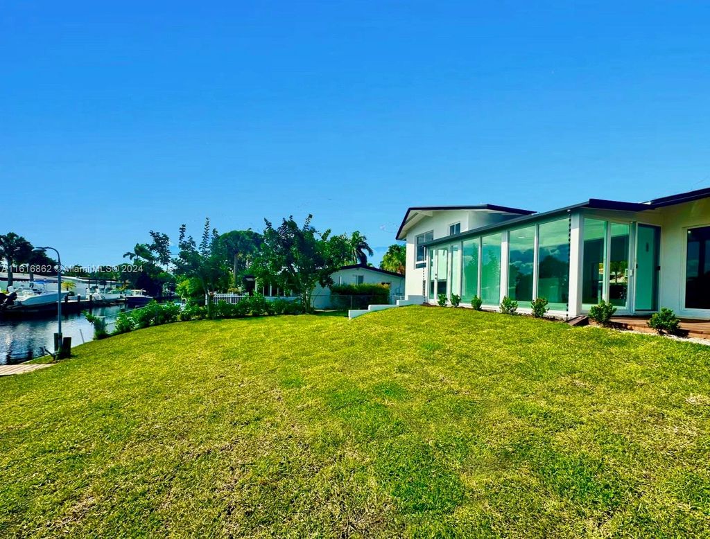 Photo of 2426 Key Largo Ln, Fort Lauderdale, FL 33312 (MLS # A11616862)