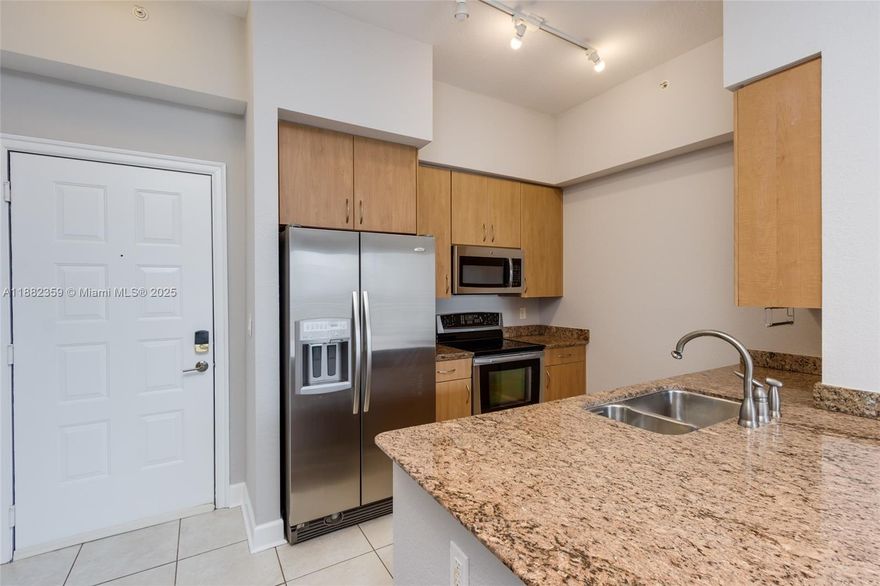 Upgraded corner unit on the 13th floor of RADIUS, a LUXURY condominium located in the heart of Hollywood, overlooking Young's Circle and Arts Park. 24/7 security, concierge and valet.  Washer/Dryer INSIDE unit. Kitchen has stainless steel appliances and granite counters. Balcony accessible from both the bedroom and the living room. Freshly painted. New keyless entry digital keypad. Parking space in the garage. Dog park located right across the street. 2-3 week COA approval. INCLUDED AMENITIES: water, cable and high speed internet, garage space, heated rooftop pool, fitness center, recreation room, internet café and movie theater. Mere minutes to the beach and Fort Lauderdale International Airport. Great landlord!