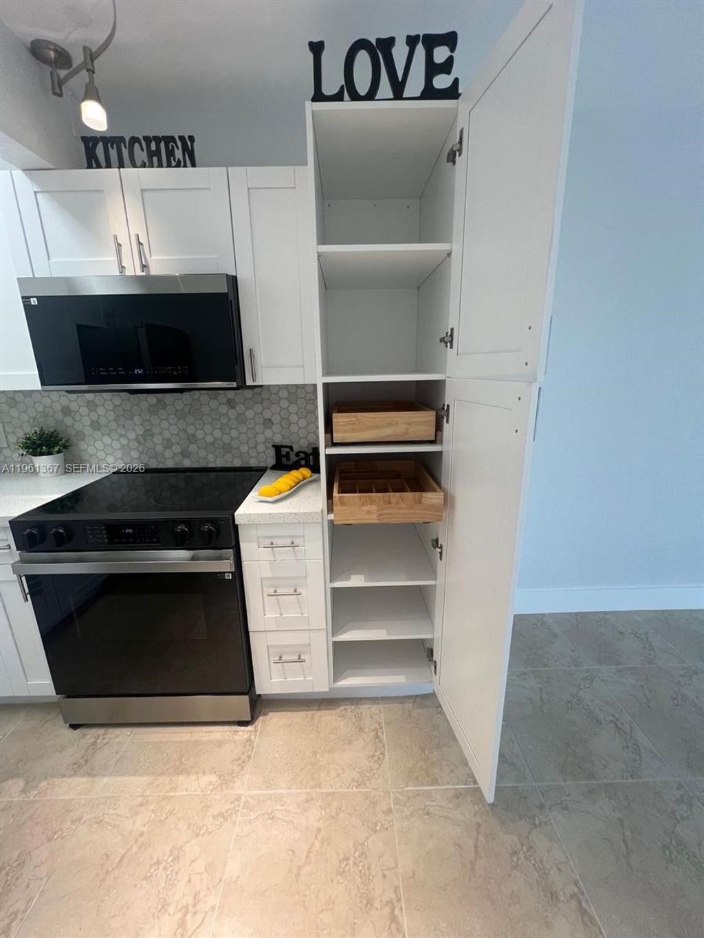 Photo of 1400 SW 124th Ter #207Q, Pembroke Pines, FL 33027 (MLS # A11961367)