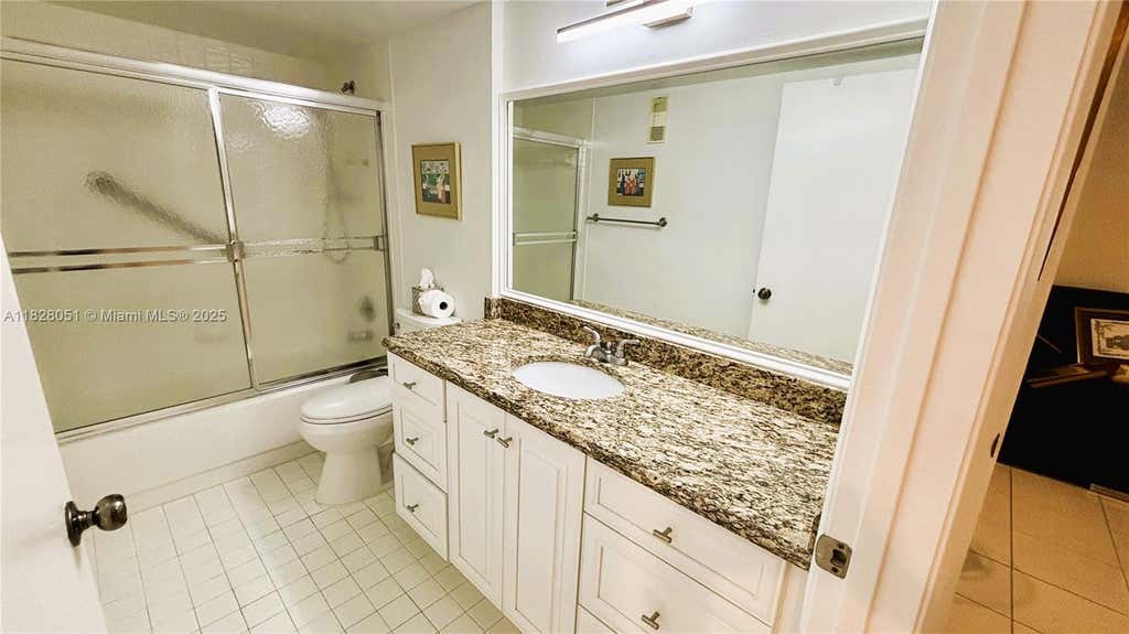 Photo of 6080 Huntwick Ter #305, Delray Beach, FL 33484 (MLS # A11828051)