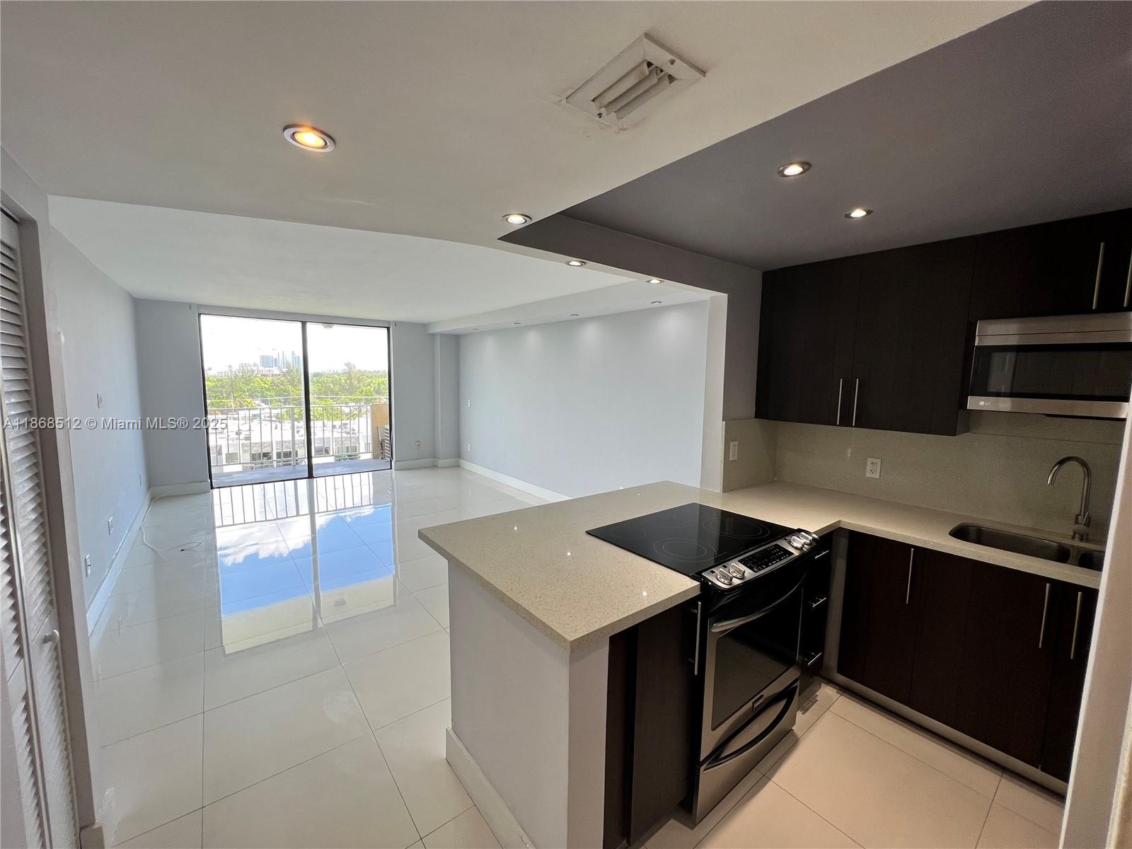 Beautiful apartment in North Miami 1-bed, 1 bath. Completely renovated unit offering comfort and style with porcelain floors throughout, an open kitchen with marble countertops, and stainless steel appliances. Enjoy generous closet space, including a beautiful walk-in and custom bedroom storage. Stunning canal and city views. Building amenities include a waterfront pool, fitness center, spa, and gated parking. Pet-friendly and ideally located near supermarkets, restaurants, and major hubs—just minutes from Aventura, Miami Beach, and midway between Miami and Fort Lauderdale. Tenant occupied, available on October 1st.