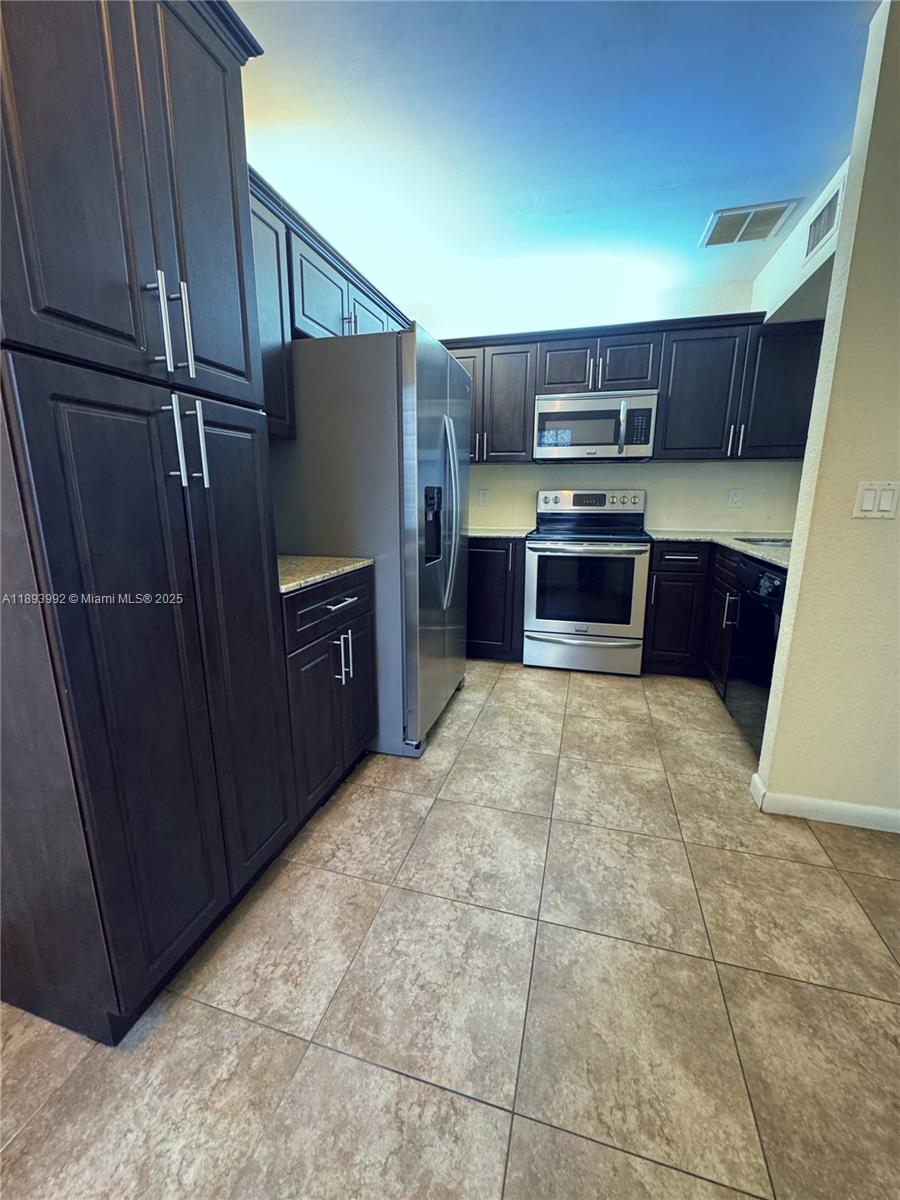 OPTIMA VILLAGE I-E CONDO - Residential Lease