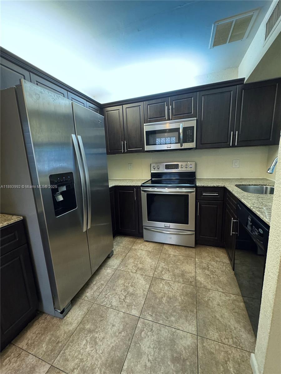 OPTIMA VILLAGE I-E CONDO - Residential Lease