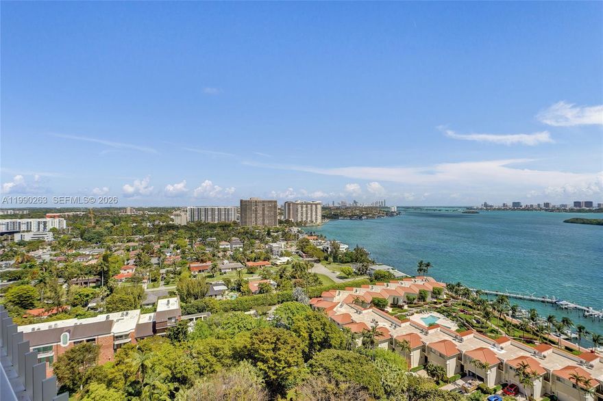 Beautifully renovated corner unit in Quayside Condo, Unit 2111, featuring 2 assigned parking spaces (a rare and valuable feature). This 2-bedroom, 2-bath residence offers 1,469 SF of living space with stunning Biscayne Bay views and breathtaking sunsets from a spacious wraparound balcony. Features include marble and wood flooring in the main living areas, a fully renovated kitchen and bathrooms, updated lighting, and modern cabinetry. Additional upgrades include smooth ceilings (no popcorn), stainless steel appliances, in-unit washer and dryer, and upgraded impact windows. Furniture included, making this a true turnkey opportunity. Enjoy resort-style living in a gated waterfront community with a full-service marina, tennis courts, multiple pools, spa, fitness center, on-site restaurant and café, and 24-hour gated security.