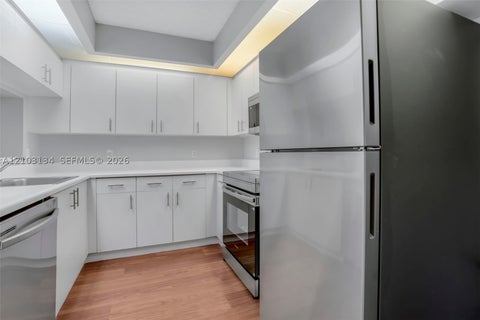 Photo of 12650 SW 15th St #110F, Pembroke Pines, FL 33027 (MLS # A12103134)