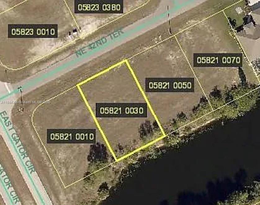 Lowest-Priced Lot in the Neighborhood! This prime vacant lot offers freshwater canal access and is surrounded by beautiful homes, making it the perfect spot to build your dream home or hold as a smart investment. Ideally located near the new VA Hospital with quick, convenient access to Fort Myers and Punta Gorda. Enjoy canoeing, kayaking, or simply relaxing by the water—this lot is your gateway to the Florida lifestyle you’ve been dreaming of! Drive by today and see the incredible value for yourself.