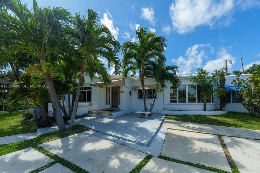 Just steps from Hollywood Beach and the famous Boardwalk, this spacious 5 bedroom 3 bathroom waterfront retreat blends comfort, style & fun. With over 3,000 SF plus a detached in-law suite, it’s perfect for large groups or guests seeking privacy. Enjoy stunning intracoastal views right from your living room, an above-ground pool, rooftop terrace, patio for al fresco dining, and even mini golf. Recent updates include renovated kitchen and hallway floors (2022) and a new parking area for up to six vehicles. Ideal for creating unforgettable memories in East Hollywood.