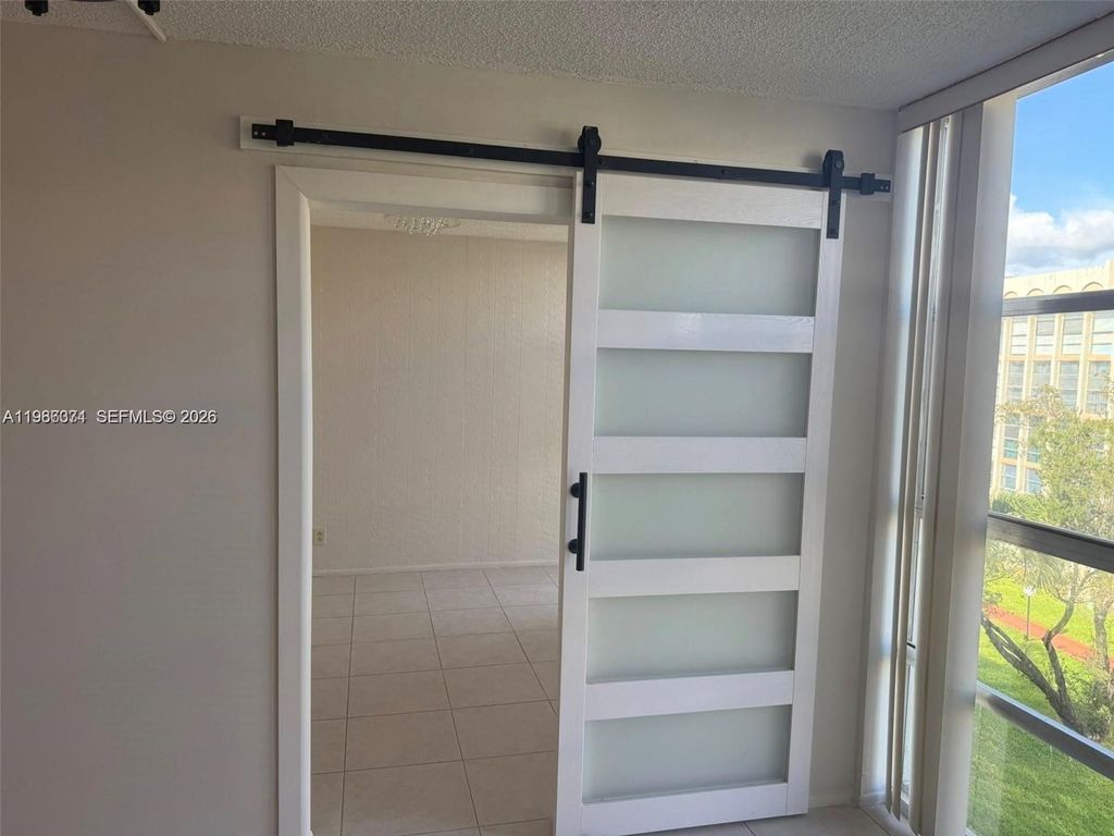 Photo of 801 Three Islands Blvd #403, Hallandale Beach, FL 33009 (MLS # A11986371)
