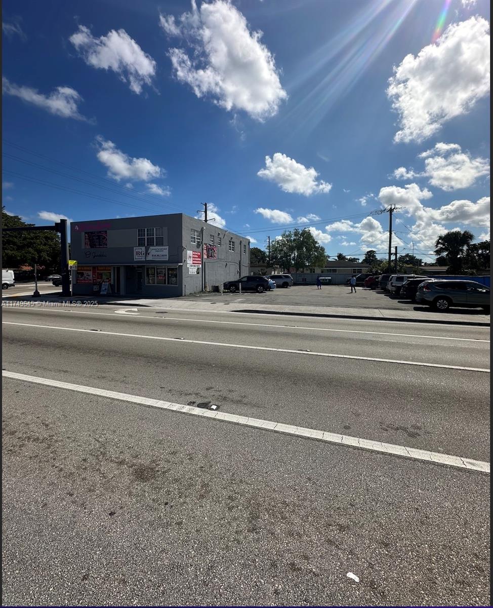 This prime investment property includes both parking lot at 6400 Pembroke Rd and the fully leased building at 6402 Pembroke road located on the SW corner of Prmebroke Rd with exceptional visibility, seeing 33,000 vehicles daily. Ideally located between 441 and Florida’s Turnpike, it offers easy access to major highways. Fully leased with tenants on month-to-month leases (they would like to stay and extend leases), it provides flexibility for immediate cash flow or redevelopment. With strong rental income, future appreciation potential, and a net operating income of $81,840 per year, this is a great opportunity for investors looking for a solid cap rate, developers or end users.