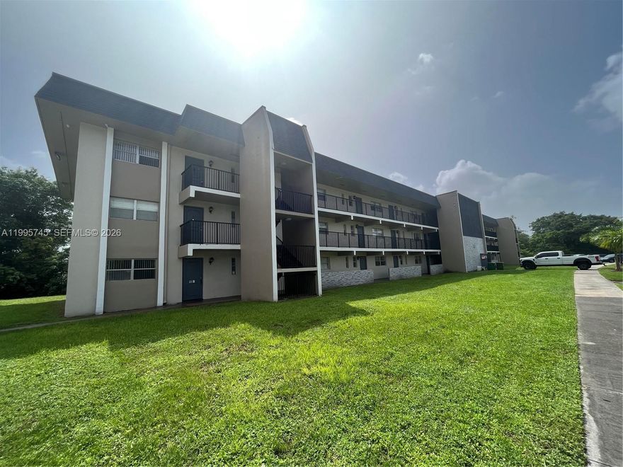 Spacious and semi-updated 2/2 condo on the 3rd floor of a well-maintained building in a highly desirable gated community in Tamarac. With new laminate flooring throughout, updated cabinet doors in the kitchen and bathrooms (installed last year), generously sized bedrooms with walk-in closets, and screened balcony with tree views. Amenities include: laundry rooms on each floor, pools, clubhouse, tennis courts, gym, bbq area. Conveniently located near shopping, dining, schools, and major roads and highways. Water included in HOA and NO rental restrictions. $54/monthly special assessment until Dec 2028. Excellent investment opportunity or perfect as primary residence.