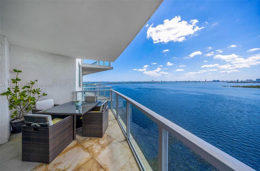 Experience breathtaking, unobstructed views of Biscayne Bay from this spacious 2 bed, 2 bath residence in a boutique building in the heart of Edgewater's NE Miami. With over 1,500 sq ft of open living space, this 2007-built condo offers the perfect blend of privacy, comfort, and location. Floor-to-ceiling windows flood the unit with natural light, while the expansive balcony provides the ideal setting to enjoy sunrise views over the water. The thoughtfully designed split floor plan features a generous primary suite with walk-in closet and spa-like bath, a large second bedroom, and a modern open kitchen ideal for entertaining. Boutique living at its best—just minutes from Midtown, Wynwood, Design District, and Downtown Miami. A rare find with this square footage and view in Edgewater!