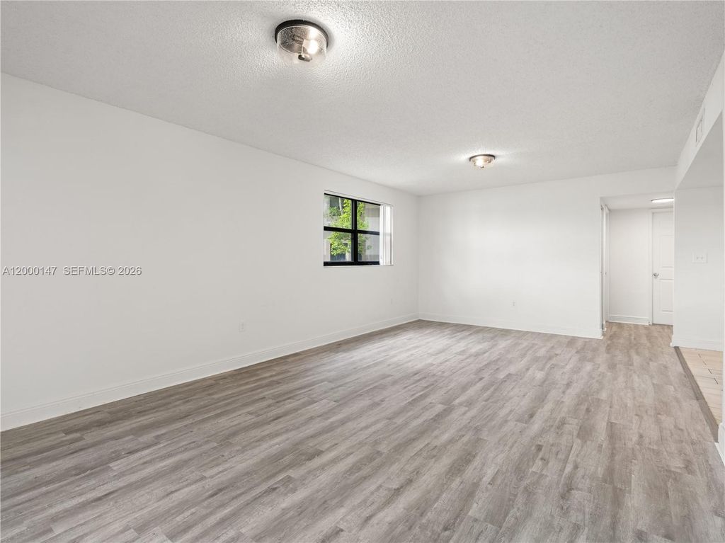 Photo of 9821 Nob Hill Ct #9821, Sunrise, FL 33351 (MLS # A12000147)