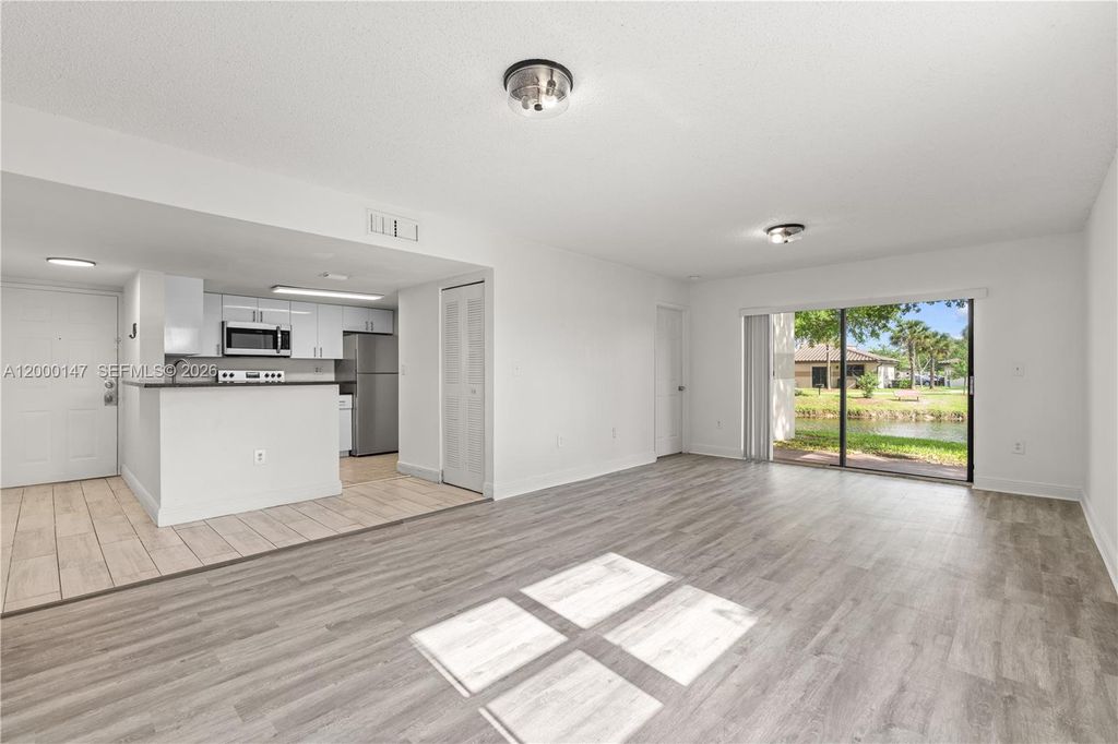 Photo of 9821 Nob Hill Ct #9821, Sunrise, FL 33351 (MLS # A12000147)