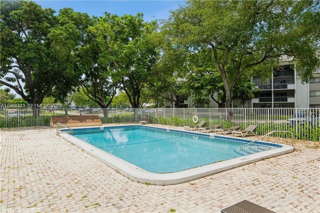 Photo of 731 N Pine Island Rd #202, Plantation, FL 33324 (MLS # A11961041)