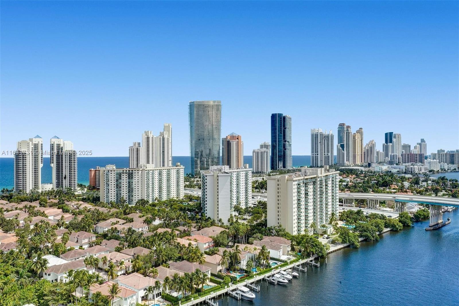 Breathtaking views of the Intracoastal Waterway & the Atlantic Ocean from the supersized balcony. Ample natural light enters the spacious living room with floor-to-ceiling high impact windows (added in '23). Elegant 24x24 white porcelain tile floors throughout. Gourmet kitchen equipped w/ stainless steel high-end appliances. Oversized Main Bedroom suite w/ balcony access, huge walk-in closet with extra storage space, bathroom w/ 2 sinks, jacuzzi and shower. 2nd bedroom with balcony access, closet space and adjacent bathroom. Washer/Dryer in unit. Turnberry Isles South is an extremely well managed building with a bright fitness center, pool w/ attendant service, hot spa area and seasonal restaurant, 24x7 front desk, security and valet. Walkable to nearby house of worship.