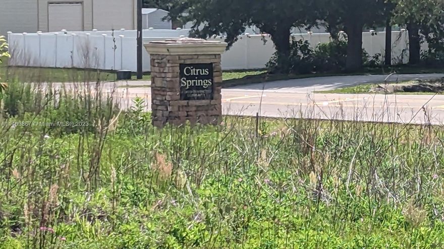 Wow... what an incredible opportunity! This commercial corner lot is situated on two major roads, Hwy 41 and Citrus Springs Blvd. It boasts a remarkable 400' frontage on Hwy 41 and 300' frontage on Citrus Springs Blvd, with a convenient 400' alleyway at the rear of the property. This prime location is perfect for future gas stations, convenience stores, and warehouses. Additionally, you have the option to place a private billboard right in front (subject to city property qualifications). Don't miss out on this amazing exposure! The Lennar project is right around the corner!