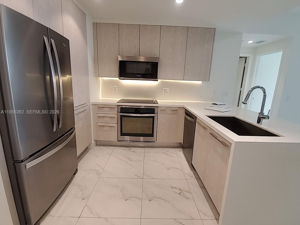 Photo of 2000 Metropica Way #412, Sunrise, FL 33323 (MLS # A11956382)