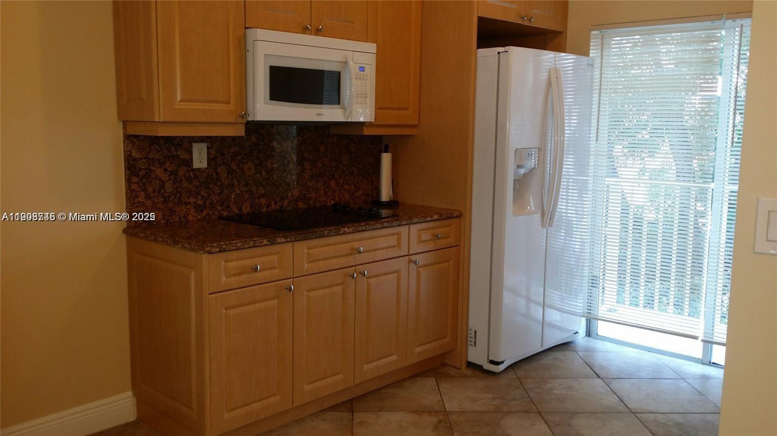 IMAGES OF KENDALL CONDO - Residential Lease