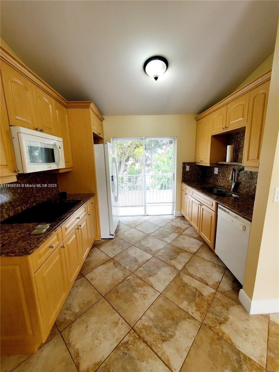 IMAGES OF KENDALL CONDO - Residential Lease