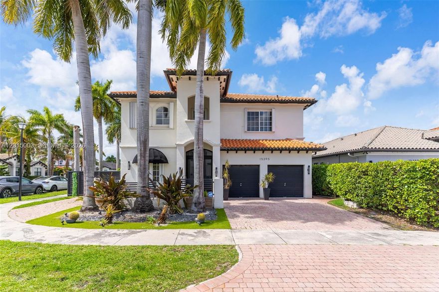 Beautiful corner lot 5-bedroom, 3-bathroom residence in a desirable location, offered move-in ready with no HOA. The home features elegant tile flooring throughout the first floor, wood staircase, and vinyl flooring on the second level. Outdoor living is highlighted by a sparkling pool and jacuzzi, summer kitchen, travertine pool deck, and paver driveway, creating an ideal setting for relaxation and entertaining.  A rare opportunity to own a spacious, stylish home in an excellent location.