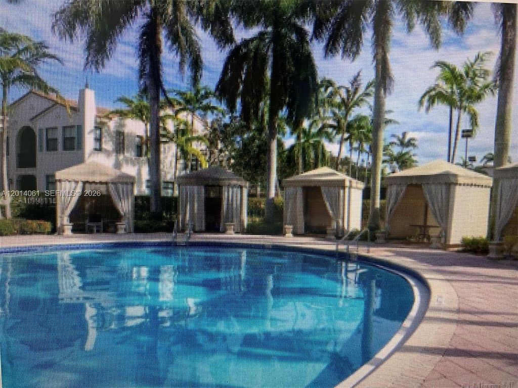 Photo of 2955 NW 126th Ave #317-5, Sunrise, FL 33323 (MLS # A12014061)