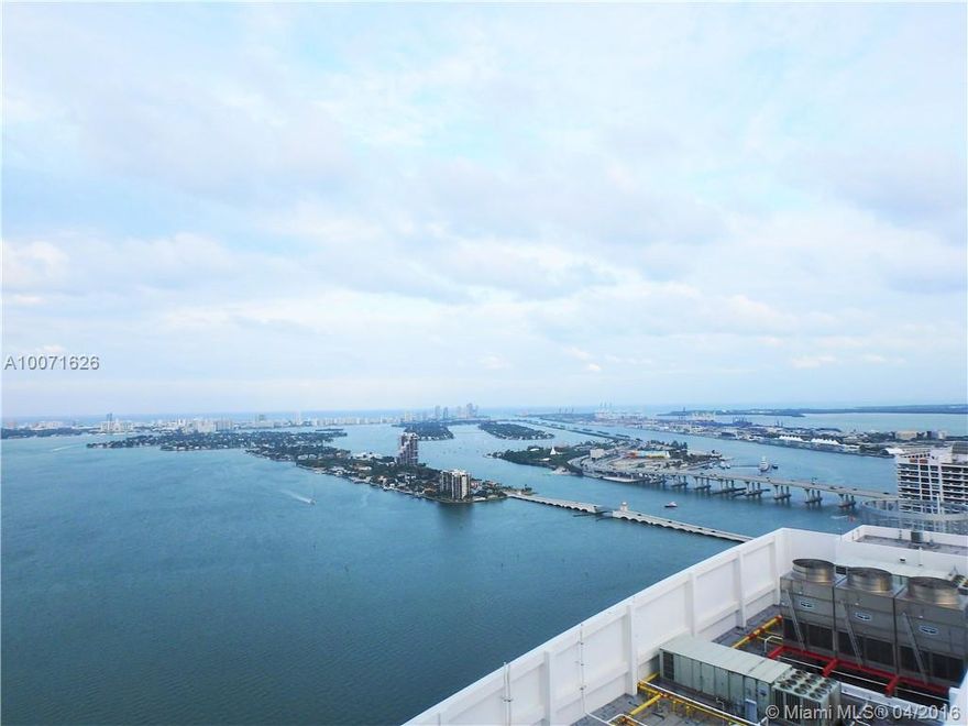 SPECTACULAR VIEWS from this immaculate studio in the Quantum on the Bay. Balcony is a corner wrap around, facing Miami Beach to the east and Downtown city lights to the South. Expansive windows and high ceilings provide a loft feel. Freshly painted, built-in closet, and meticulously maintained bathroom and kitchen make this open, spacious unit the ideal place to call home. Quantum features two pools, a two story fitness center, meeting areas, a theatre room, market, salon, valet, 24 hour security & more.