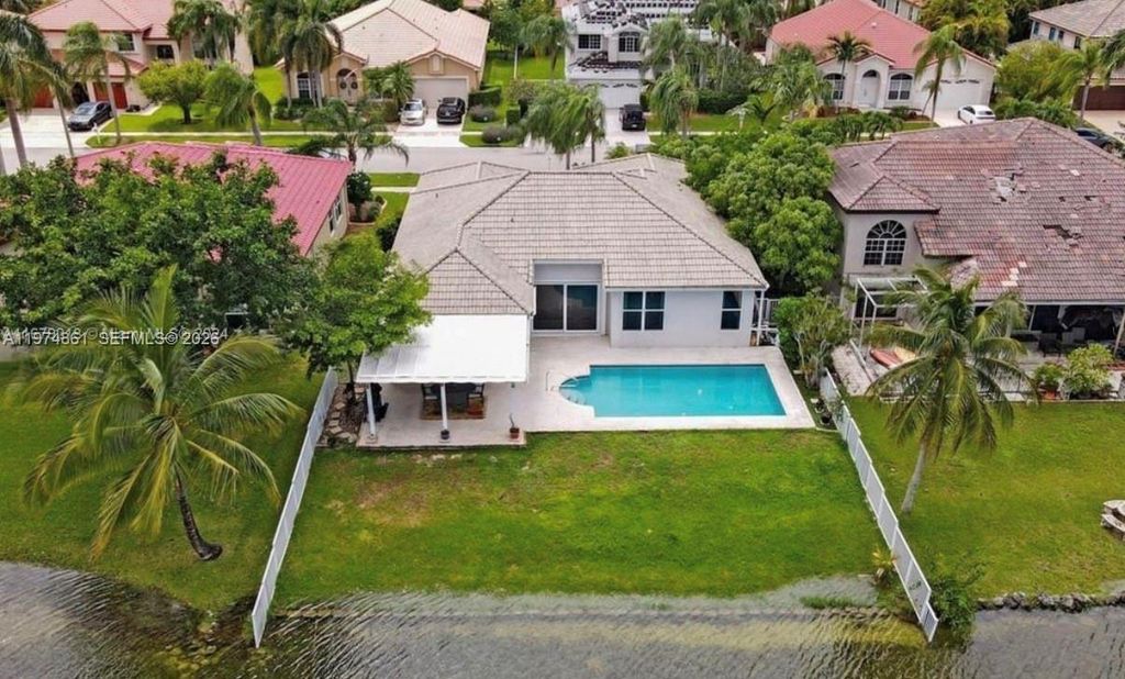 Photo of 18335 NW 12th St, Pembroke Pines, FL 33029 (MLS # A11974861)