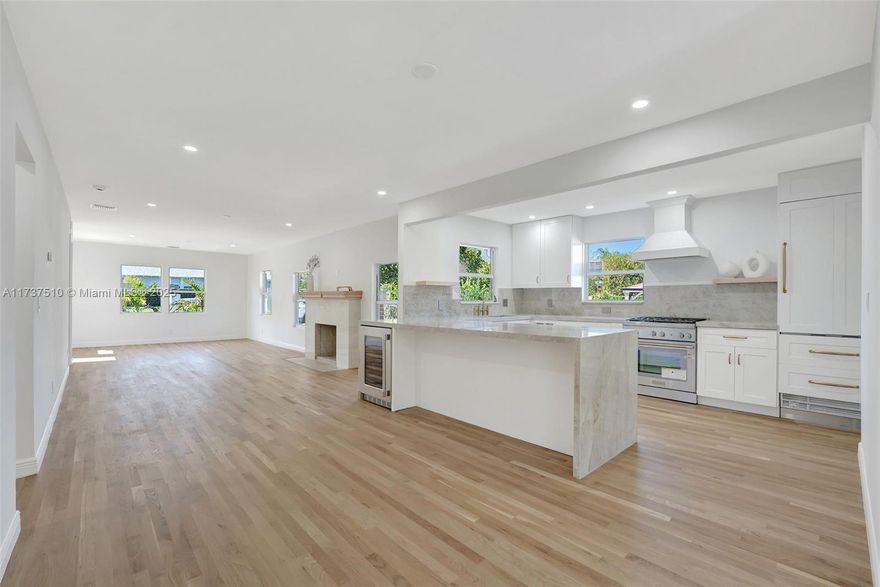 Welcome to this stunningly gut renovated ( New roof, Hurricane Impact windows, lighting,
Floors, complete update) 3-bedroom, 2-bathroom home, located in the heart of West Palm
Beach&#39;s highly sought-after historic Grandview Heights. Built in 1923, meticulously restored
to maintain its historic character. Blending historic charm with modern luxury, this
residence has been thoughtfully updated while maintaining its timeless appeal, with high
quality finishes, white oak natural wood floors, exquisite marble bathrooms, Thermador
appliances in the kitchen with Taj Mahal stone in a perfected designed chefs’ kitchen .Recently
installed a new pool (salt) and a wood deck. Open concept layout seamlessly connects the living room and dining area.
