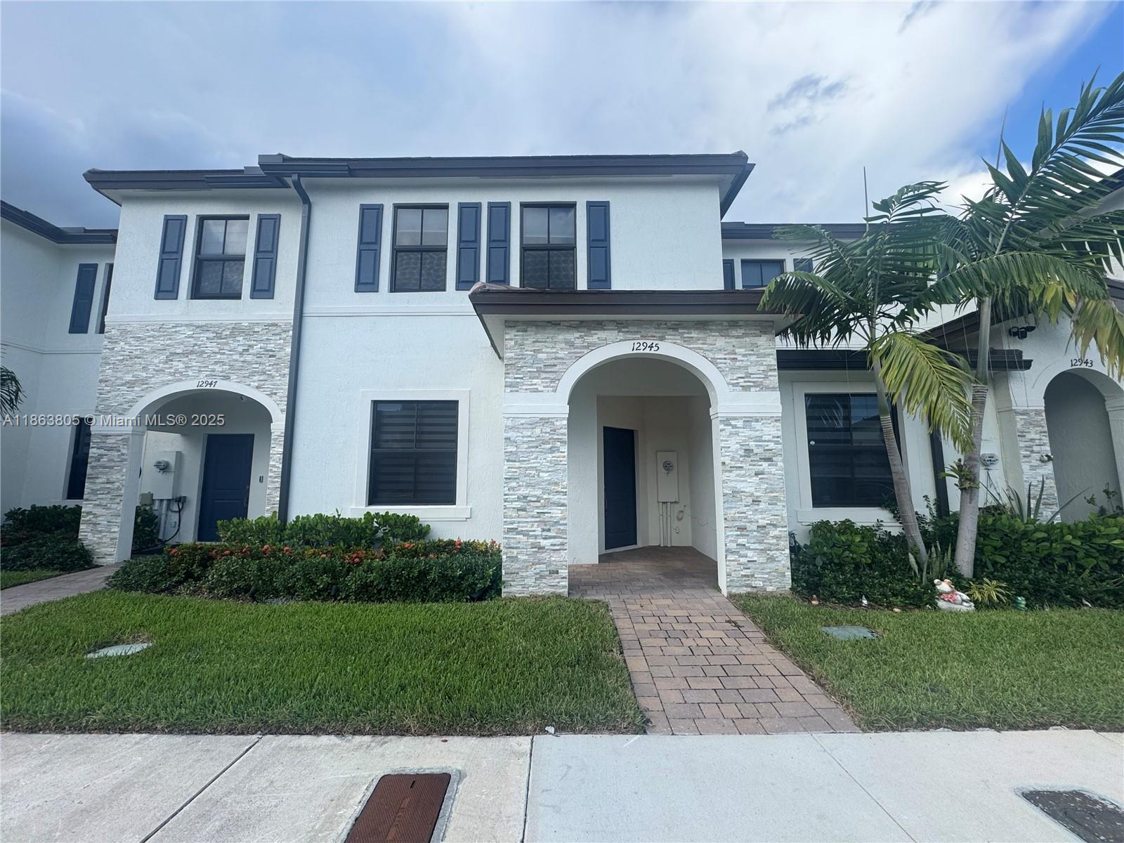 Welcome to this beautiful and modern townhouse in the highly desirable Siena Reserve community. This spacious 3-bedroom, 2.5-bath home offers modern comfort and convenience, with two assigned parking spaces right in front of the unit. The first floor features a bright open layout with ceramic tile flooring, a modern kitchen equipped with stainless steel appliances, granite countertops, and wood cabinetry. The fenced patio is perfect for outdoor living and entertaining. Upstairs, you will find all three bedrooms, including a master suite with a walk-in closet. Additional highlights include impact windows, a concrete structure for durability, and a conveniently located washer & dryer on the second floor. Do not miss the opportunity to make this
move-in-ready townhouse your new home!