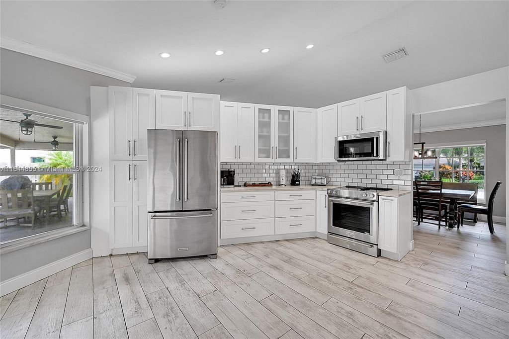 Photo of 9841 SW 1st St #9841, Plantation, FL 33324 (MLS # A11644855)