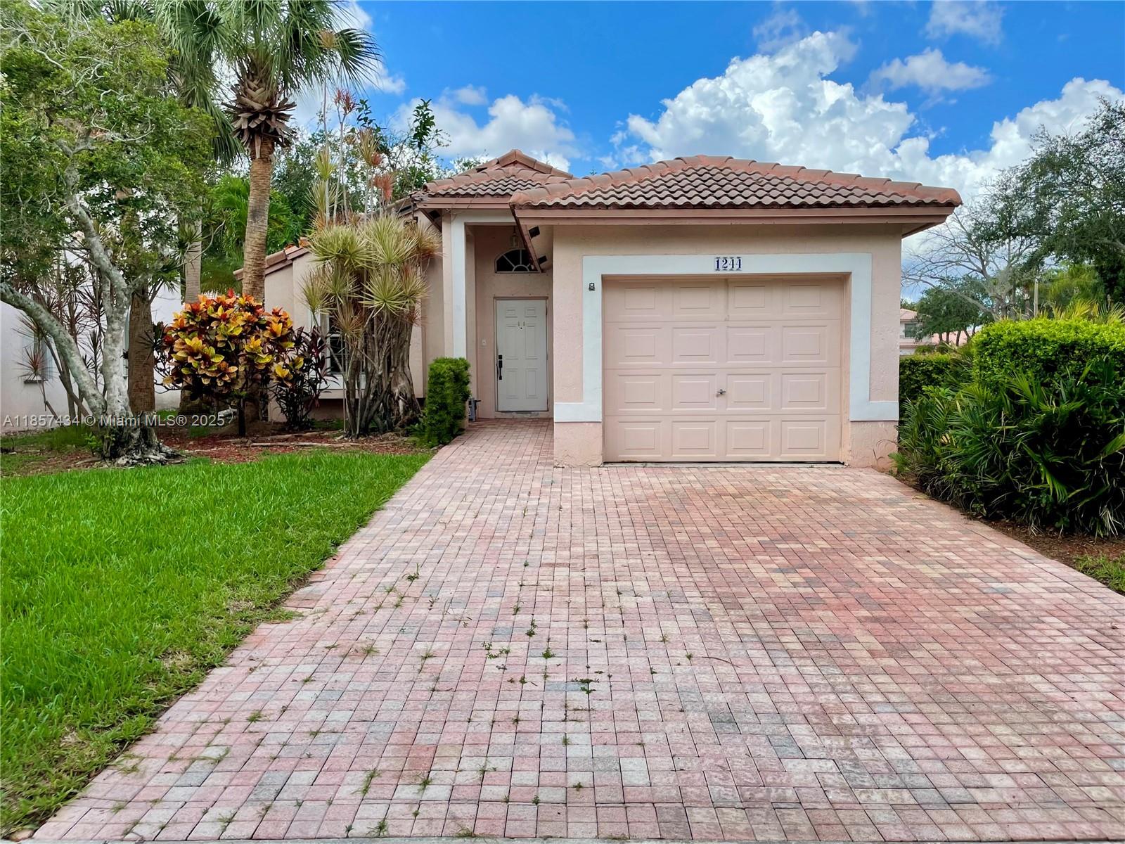 A rare chance to own in the prestigious guard-gated Pembroke Isle! This 3/2 corner-lot home offers 1,416 sq ft of living space, a one-car garage, and sits on a 5,000+ sq ft lot. Features include a screened-in backyard lanai with a tiled area ready for an outdoor kitchen. Conveniently located near I-75, A+ rated schools, shopping, restaurants, parks, hospitals, and golf. Offered at a great price, it’s the perfect opportunity to customize your dream home—upgrades are needed, and sellers are willing to provide credits to help buyers. Low HOA fees cover 24/7 security, internet, DirecTV, and lawn care. Enjoy resort-style amenities including a newly remodeled clubhouse, pools, fitness center, tennis courts, and playgrounds.