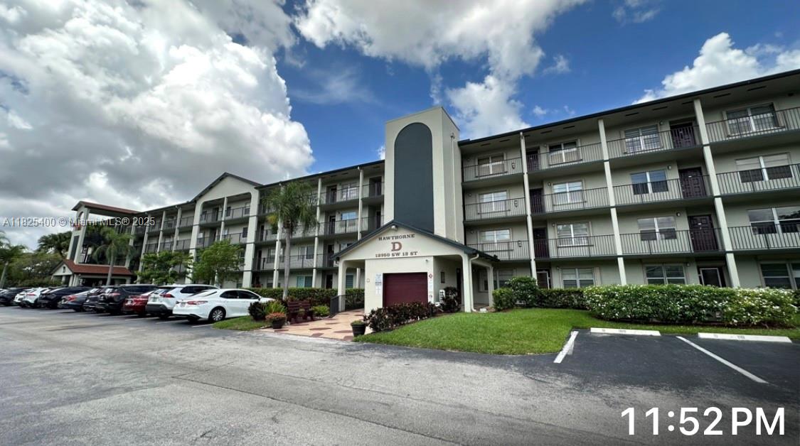 A NICELY maintained 2 bed/2 bath WATER FRONT HOME, Featuring tile and carpet in the bedrooms. This vibrant residence boasts a modern kitchen with granite countertops, stainless steel appliances, and in-unit washer and dryer. Unit had impact windows and sliding doors going out to breathtaking lake view. Ideally located near major highways, malls, restaurants, & entertainment. Nestled in the highly sought-after Century Village of Pembroke Pines, a vibrant 55+ community packed with resort-style amenities, like pools, tennis, pickleball, golf, billiards, gyms, clubhouse, a shuttle bus, and 24/7 security — all designed for your enjoyment & peace of mind. Water, cable, internet, and Wi-Fi are included in the monthly association fees