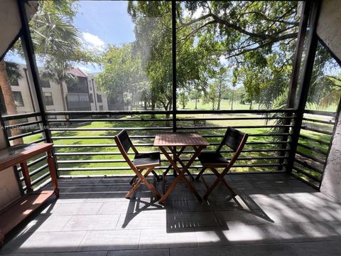 Photo of 7950 W Mcnab Rd #222, Tamarac, FL 33321 (MLS # A11792568)