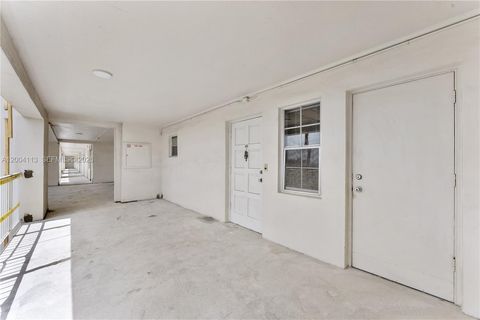 Photo of 2661 S Course Dr #805, Pompano Beach, FL 33069 (MLS # A12004113)