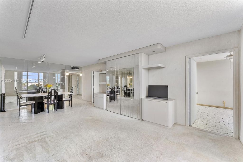 Photo of 2661 S Course Dr #805, Pompano Beach, FL 33069 (MLS # A12004113)