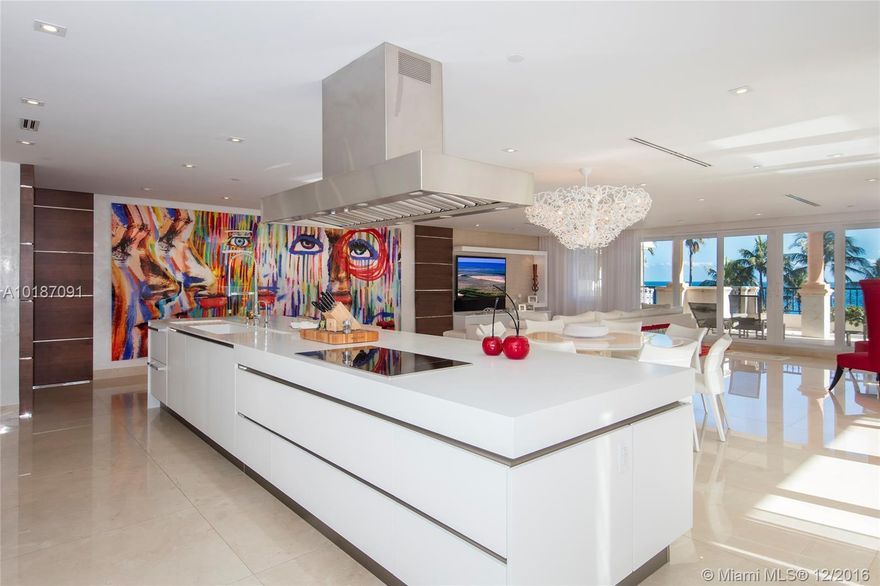 This stunning Oceanside residence is truly a work of art. This chic/modern home boast 3,140 SF of impeccably designed interior w/crema marfil marble floors, spacious open living & dining layout, custom built kitchen & walls of glass w/ocean views. Spectacular master suite w/custom closet spaces, private balcony & mater bath w/Carrera marble. The other 2 bedrms are expertly designed w/full en-suite baths.  Lrg wrapping balcony w/beach & ocean views, plus 2 priv. balconies w/views to the golf.