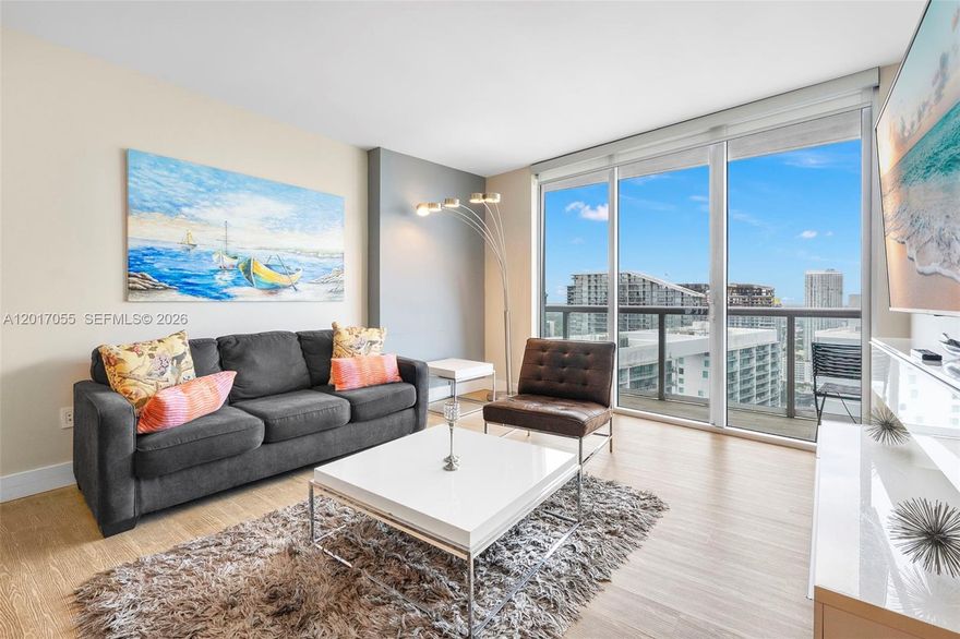 Fully furnished, Airbnb-approved residence on the 46th floor of Icon Brickell III (also known as W Miami). West-facing floor-to-ceiling windows and a private terrace frame sweeping views of Brickell, Downtown Miami, the Miami River, and sunsets over the city skyline.The modern kitchen features Italian cabinetry, stone countertops, and fully-integrated Sub-Zero/Wolf appliances, while the primary suite offers a walk-in closet and double-sink bathroom. An in-unit washer and dryer round out a thoughtfully designed space. With no rental restrictions, this unit generates income from day one — equally suited as a primary residence, vacation home, or high-performing short-term rental. 

Residents enjoy a full amenity package including a 300-foot infinity-edge pool, full-service spa, state-of-the-art fitness center, signature dining, valet, concierge, and exclusive W Hotel services. Ideally located in the heart of Brickell, surrounded by the bay, a scenic boardwalk, and lush parks, just steps from Brickell City Centre, top dining, shopping, and nightlife.