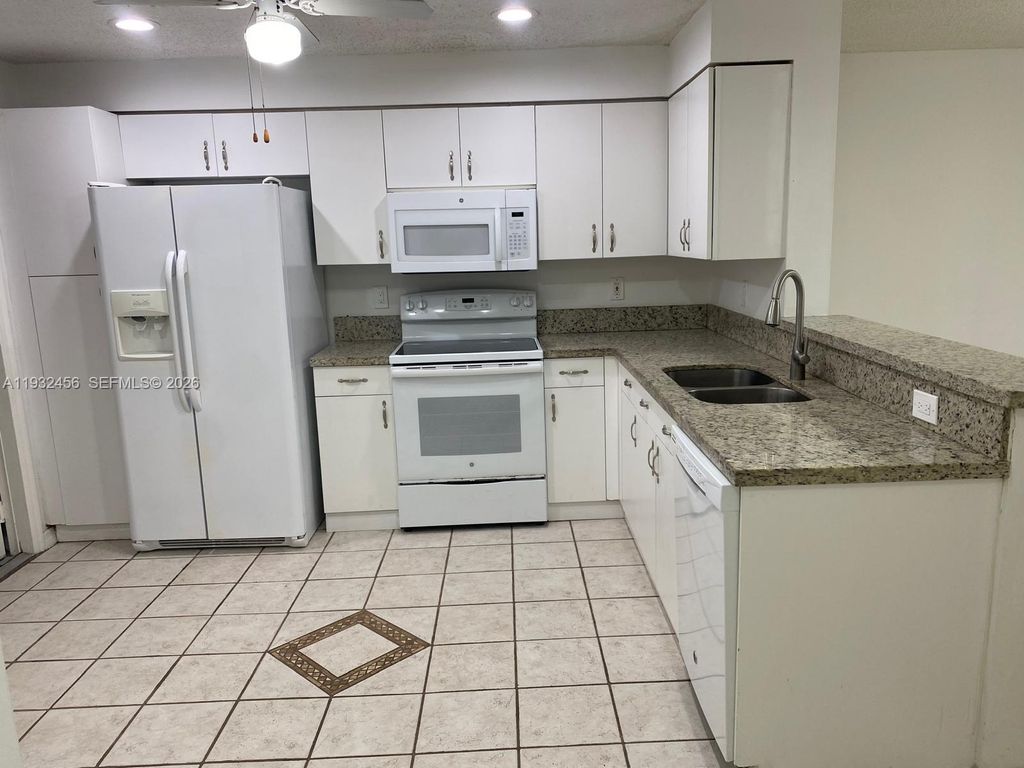 Photo of 1384 Veracruz Ln #4-7, Weston, FL 33327 (MLS # A11932456)