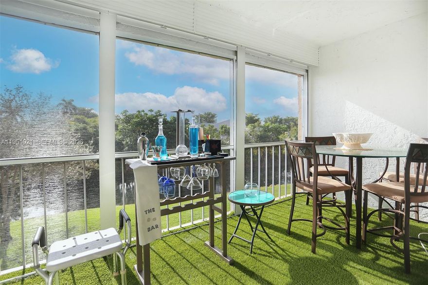 This is the turnkey waterfront escape you've been waiting for. Located in the sought-after Coral Gate community, this immaculate 2/2 unit offers sweeping LAKE VIEWS that greet you the moment you walk in.
Sold FULLY FURNISHED with high-end decor. Just bring your suitcase
Enjoy your morning coffee on the screened balcony watching the water.
Features pristine tile floors, a spacious kitchen, and impact protection. Community offers 3 heated pools and a clubhouse. Perfect for seasonal residents or investors looking for immediate rental income.