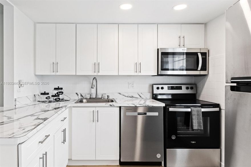 Beautifully Updated 2-bedroom, 2-baths condo offering tranquil water views and a bright, open layout designed for comfort and style. This move-in-ready unit features a modern kitchen With all BRAND-NEW appliances, updated finishes, renovated bathrooms, and elegant flooring throughout, creating a welcoming and refined living space. Enjoy a prime location within a highly desirable community that offers exceptional resort-style amenities, including sparkling swimming pools, an elegant clubhouse, BBQ and outdoor entertaining areas, billiards, card rooms, fitness center, and a spacious ballroom for social and community events and more. The community is ideal for Active Seniors lifestyle while still providing a peaceful and well-maintained environment. Conveniently located near shopping, dining, and everyday essentials, this property also offers the added benefit of a low HOA. A rare opportunity to own a beautifully maintained 2-bedroom unit with water views in a sought-after community, perfect for enjoying comfort, convenience, and quality living.Do not missed it. Easy to Show.