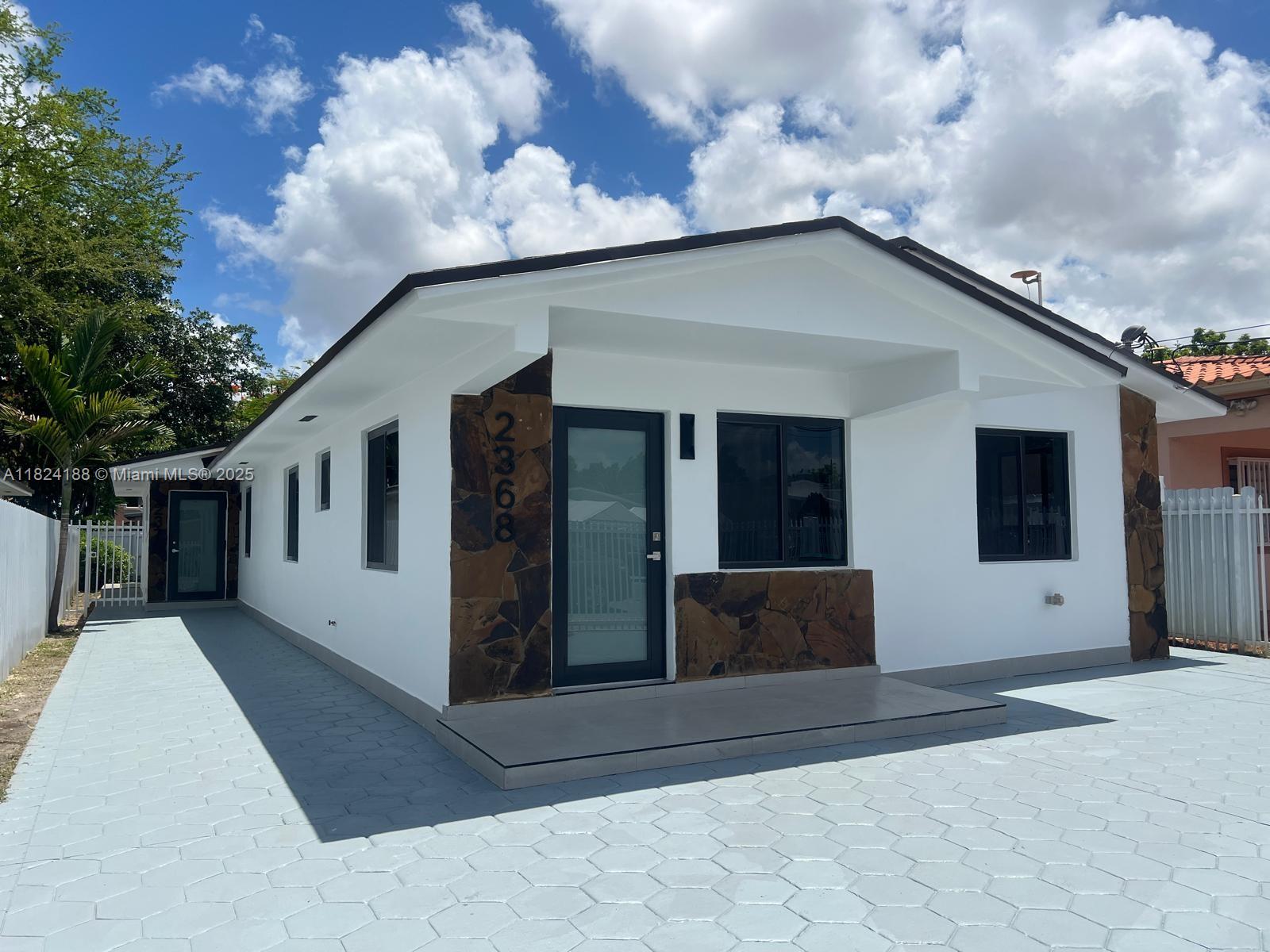 Fully remodeled duplex for sale in the heart of Miami, a unique opportunity for investors or owner-occupants seeking rental income. Front unit is a 2-bedrooms, 1-bath. The rear unit is a spacious 3-bedrooms, 2-bath. Both feature modern kitchens, updated bathrooms, impact windows, and in-unit laundry rooms. The property is fully fenced, with ample gated and street parking—turnkey, move-in ready, and built for low-maintenance cash flow. Minutes from Wynwood, Design District, Brickell, and Miami International Airport, this duplex is positioned for growth and strong rental demand. With a potential income of $79,200 per year and financing available, this is your chance to invest in one of Miami’s hottest neighborhoods. Each unit has its own electricity and water meter. Tenants pay utilities.